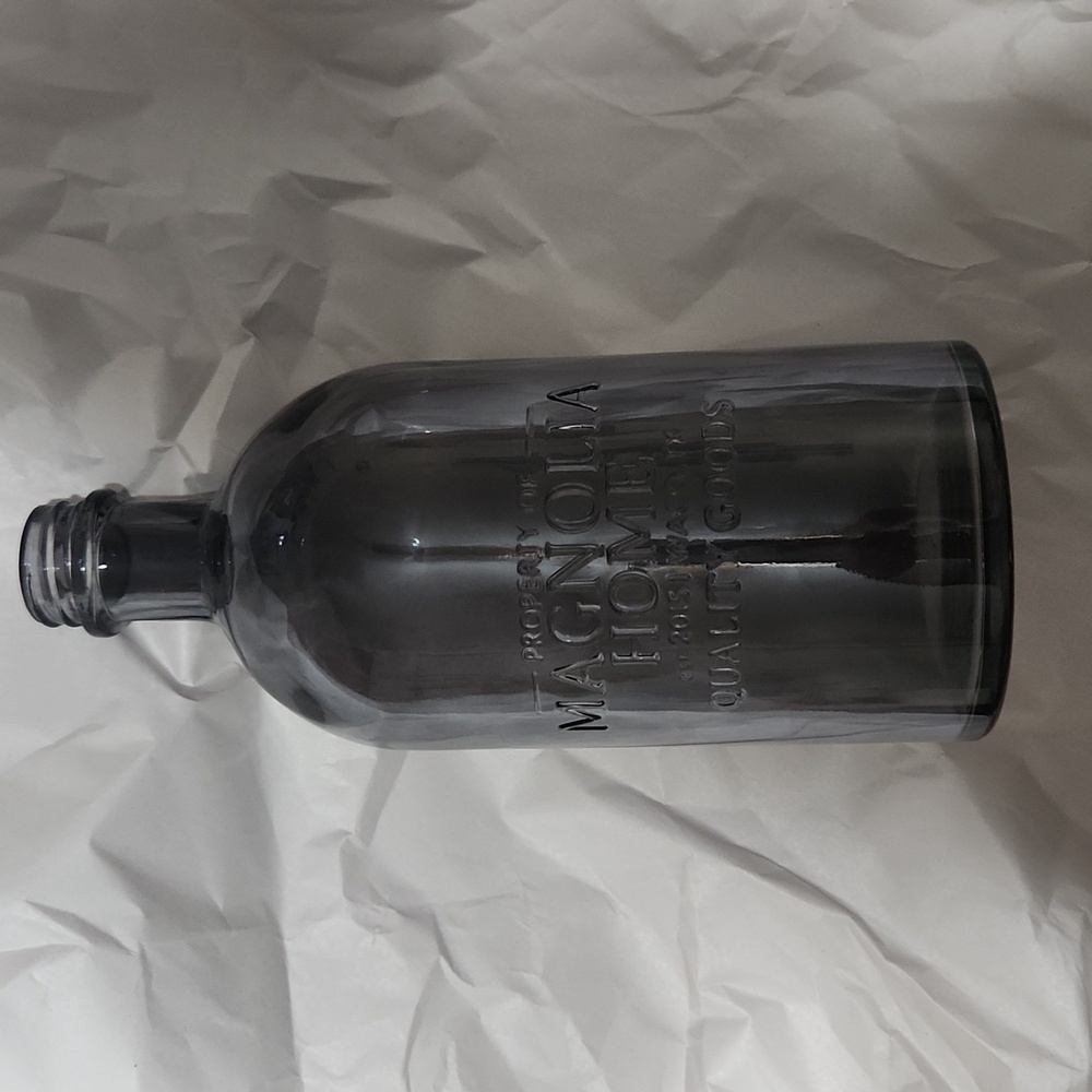 Pretty medium gray glass bottle vase.